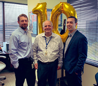 OBXtek team members in office